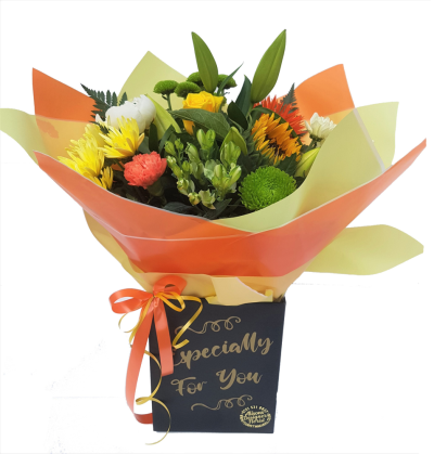 Especially for you -  Hand-tied - A bright and vibrant mix of orange and yellow florists choice flowers creates this never forgotten hand-tied bouquet of fresh flowers. Perfect to brighten anybody's day.