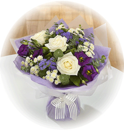 Lilac Delight - Lilac's, Purples and creams are the star combination in this  pack hand-tied. Roses take the lead with Lisianthus and Chrysanthemums. The Ideal Gift to brighten anybody's day.