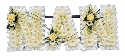 White Funeral Lettering - A massed chrysanthemum Nan base edged in white pleated ribbon with sprays to match with Large headed White Roses and foliage. Beautifully created by our expert team of florists in Maghull & Lydiate, Liverpool, Merseyside.