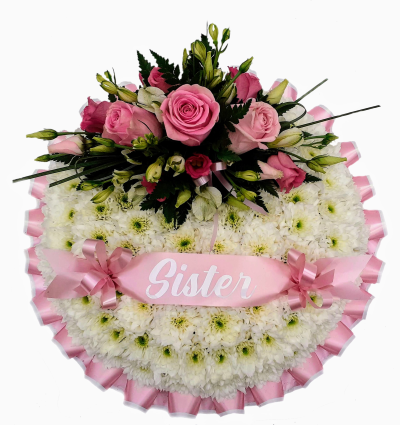 Massed Posy Pad - Pink & White - An all round posy design created of white double spray chrysanthemums and with a beautiful spray of soft pink roses and a mix of pink and white flowers, foliage and a pink ribbon