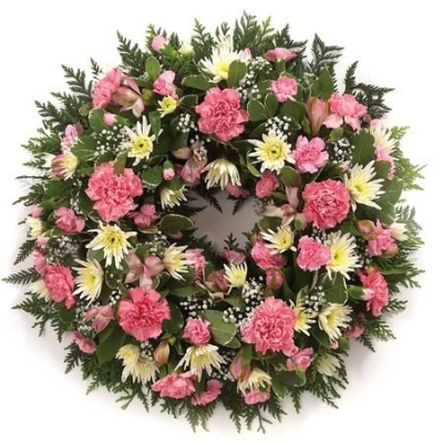 Funeral wreath- Pink & White - A simple design pink and white wreath made with carnations and delianne chrysanthemums and a mixture of foliage's created by Alison's designer florist in Maghull, Liverpool