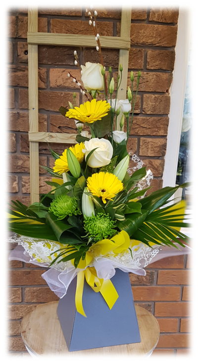 Yellow Gerbera Modern Hand-tied Bouquet - A modern style bouquet is hand arranged, tall and front facing  A very popular design here at Alison's Designer florist .The perfect gift to brighten anybody's day.